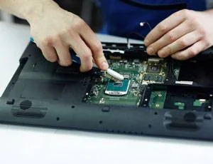 Certified Technicians for Mail-In Repairs working on device