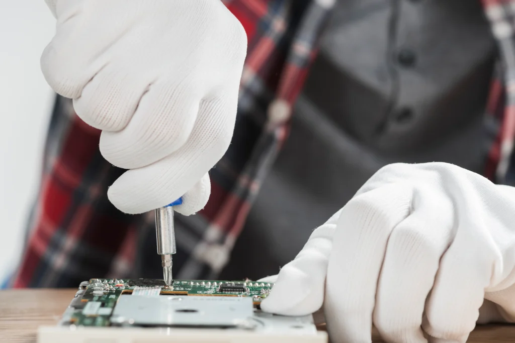 Dell laptop repair service with certified technicians fixing screen, battery, and motherboard issues