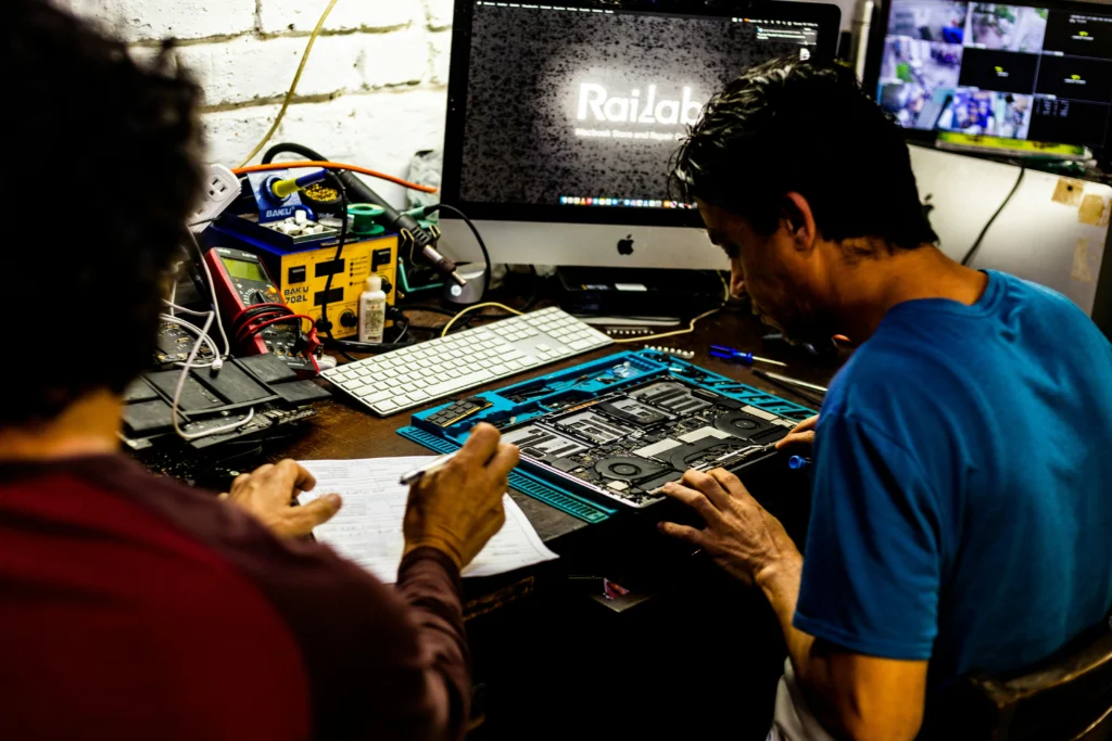 Laptop repair service performed by a certified technician diagnosing hardware issues