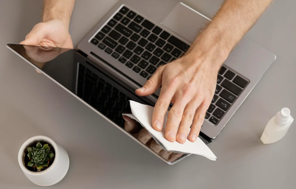 Expert technicians restoring a Digital Storm laptop affected by liquid spills