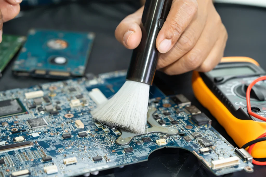 gigabyte laptop tune up internal cleaning service removing dust from fan