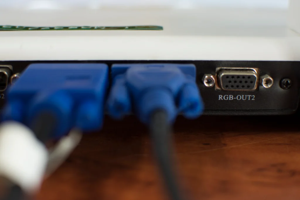 Laptop DC power jack charge port repair service showing technician fixing a laptop charging port