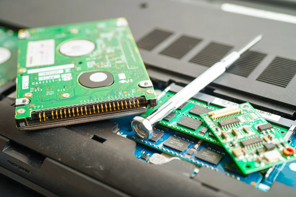 Micro-soldering process during HP laptop motherboard fixing service