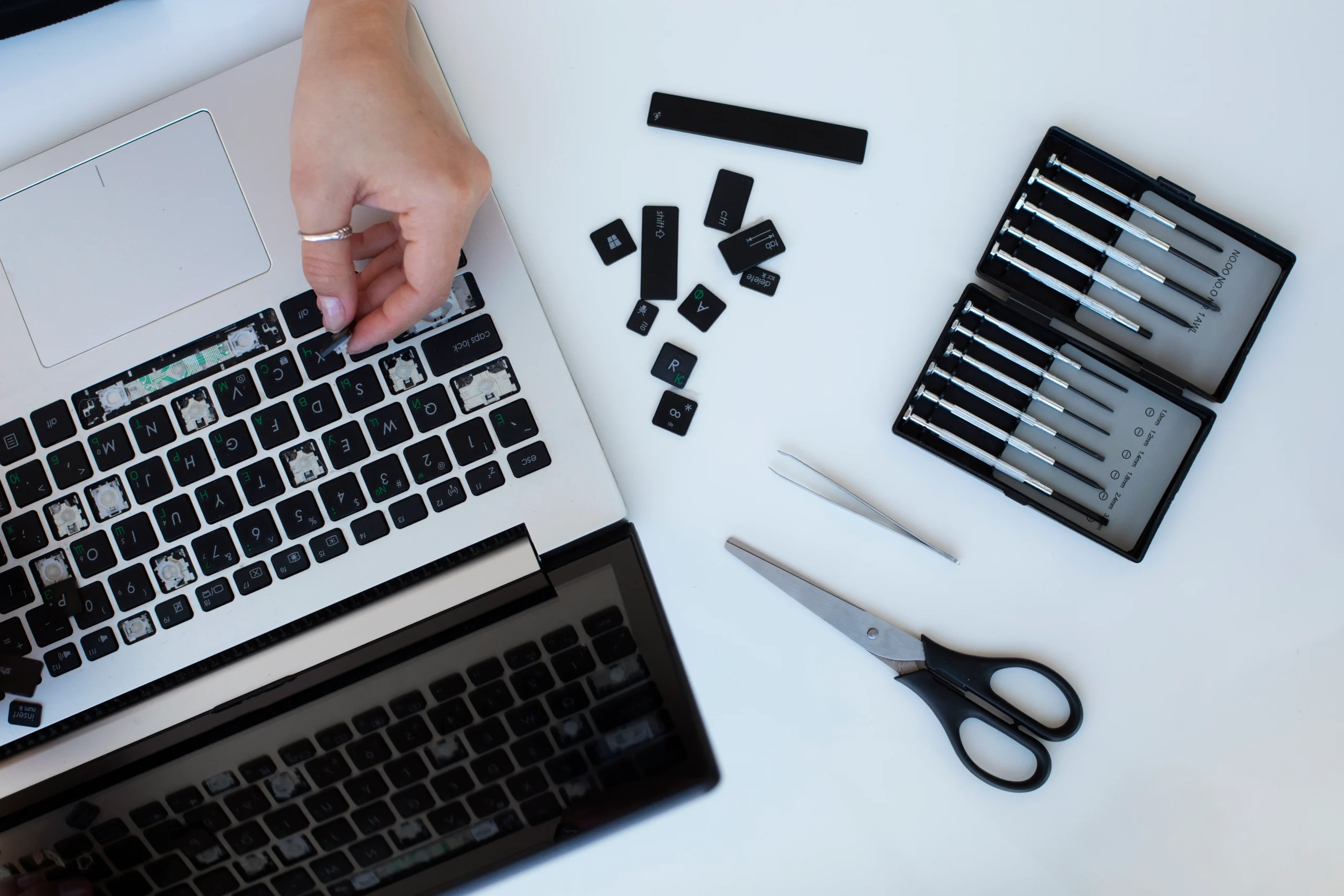 MSI laptop keyboard and touchpad repair performed by technician fixing keys and touchpad issues