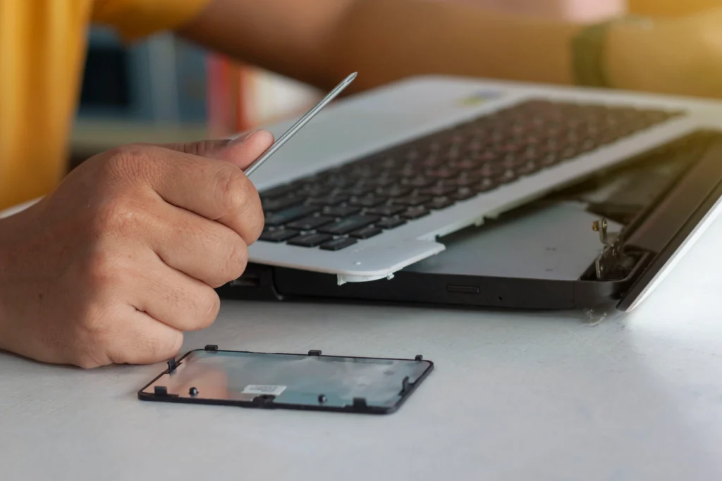 ROG Laptop Battery Replacement process with internal components exposed